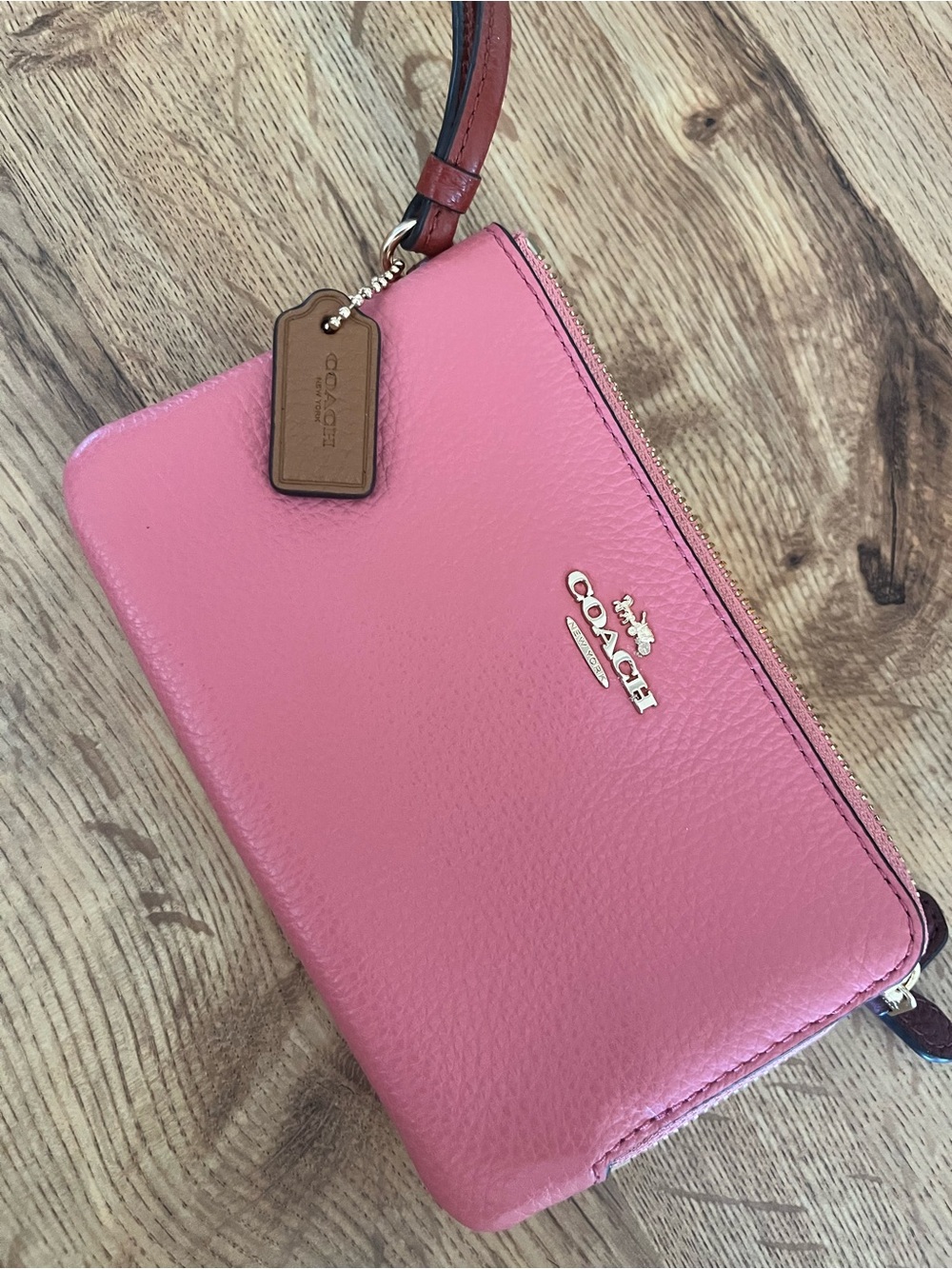 COACH Pink Pebbled Leather Wristlet with Gold Hardware